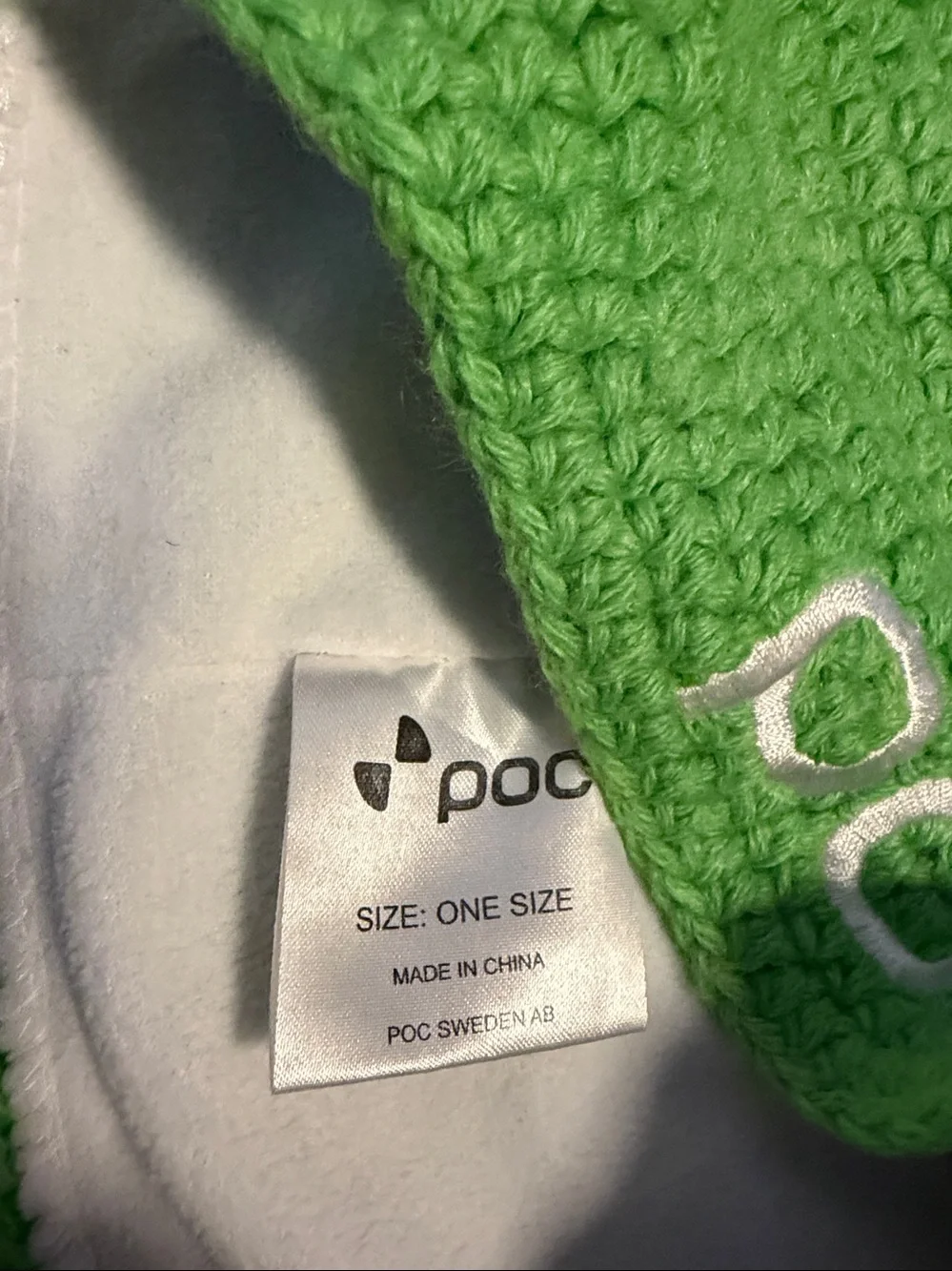 POC Crochet Headband featuring the distinctive white POC logo